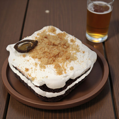 Chocolate Guinness Cake with Malted Milk Frosting Topped with Malt Crumb