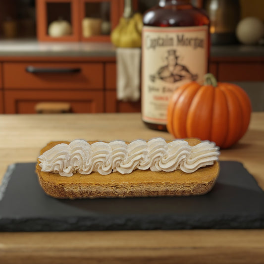 Pumpkin Cheesecake with Cinnamon Rum Whipped Cream