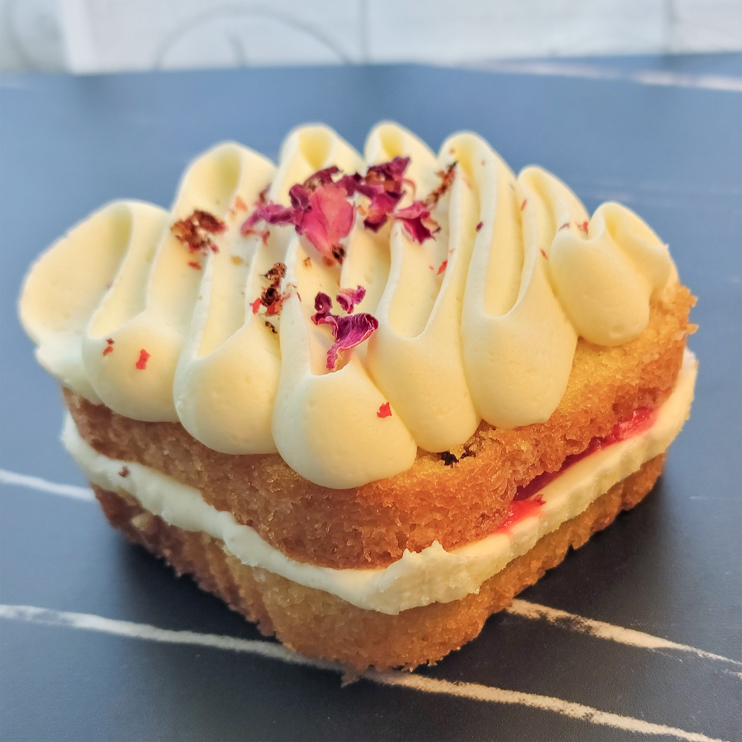 Pink Peppercorn Cake with Rose Cream Cheese frosting and Strawberry Compote